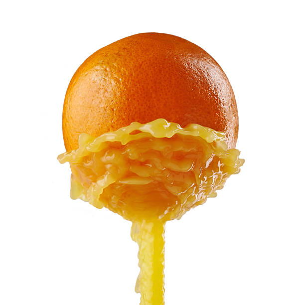 istock orange juice splashing on a white background 503563521