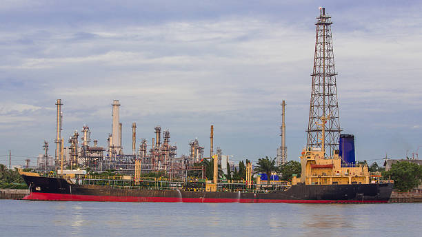 istock Oil refinery plant along the river before sunset, Thailand 503563959