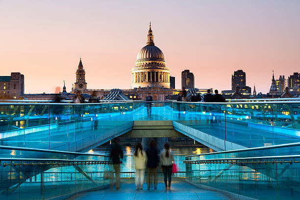 istock Millennium Bridge lit up at night, London 503564326