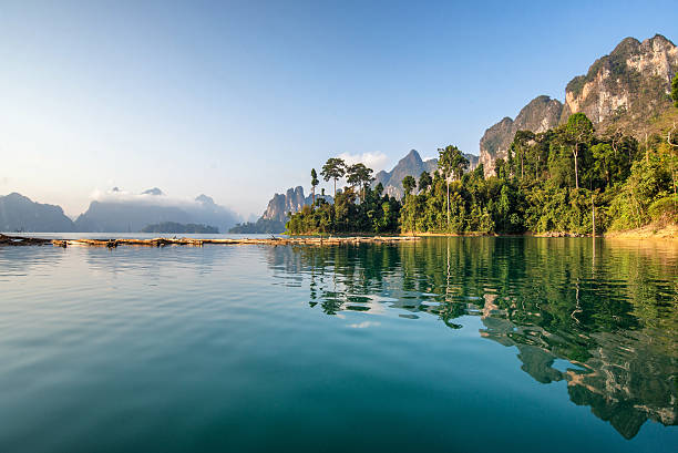 Beautiful mountains lake river sky and natural attractions Beautiful mountains lake river sky and natural attractions in Ratchaprapha Dam at Khao Sok National Park, Surat Thani Province, Thailand. kao sok national park stock pictures, royalty-free photos & images