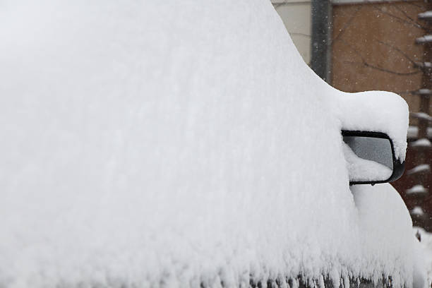 istock car under a snowbank 503566014