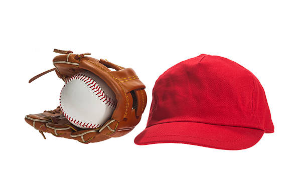 istock Little League baseball glove and red hat on white background 503566030