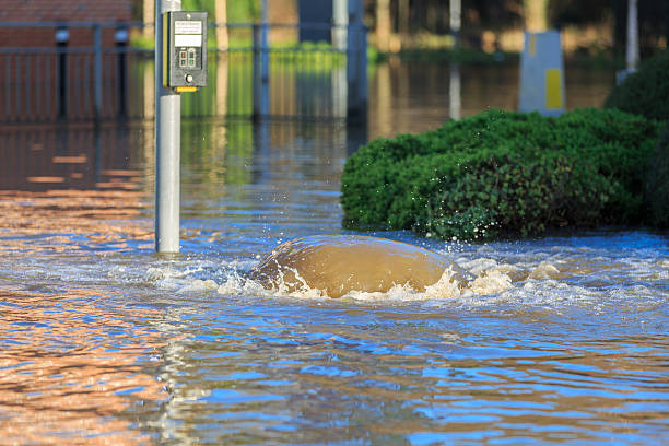istock Overflowing drain during a flood in Leeds 503566116
