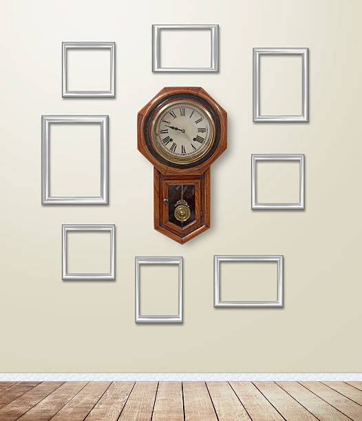 istock Old clock decor on wallpaper with light flare. 503566550