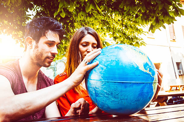 istock Young Couple Thinking About Where To Go On Trip 503566591