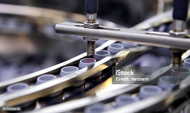 Bottling And Packaging Of Sterile Medical Products Machine Afte Stock Photo - Download Image Now