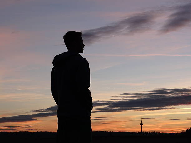 istock Silhouette of young boy 503567304