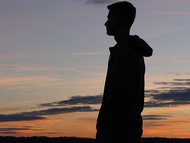 Teenager silhouette stock photo
