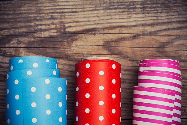 istock Rolls of colored wrapping paper on wooden background 503567825