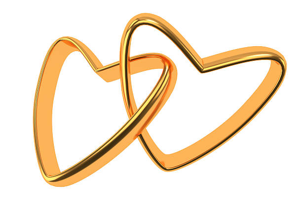istock Two gold hearts rings isolated on white 503568124