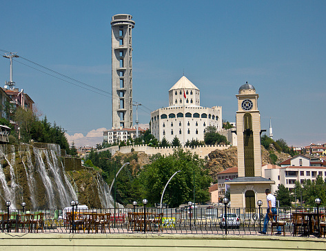 Ankara, Turkey- August 15, 2015: A waterfall and mosque view in Keçiören which is a metropolitan district of Ankara Province in the Central Anatolia region of Turkey, a crowded district in the northern part of the city of Ankara. According to 2010 census, population of the district center is 817,262. The district covers an area of 190 km2 (73 sq mi), and the average elevation is 850 m (2,789 ft). The Çubuk River runs through the middle of the district.