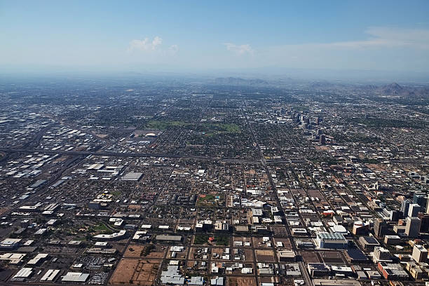 istock Flight over Phoenix Arizona with low cloud on the horizon 503568443