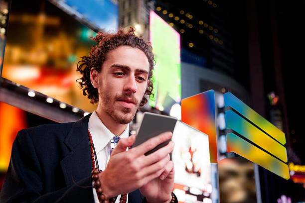 istock Man with cell phone in New York City. 503568982