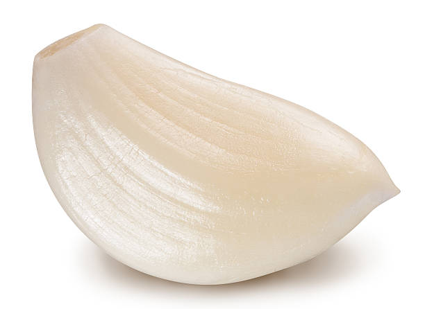 istock Peeled garlic clove. 503569016