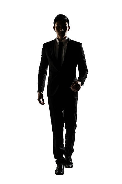 istock Confident businessman walking toward you 503570127