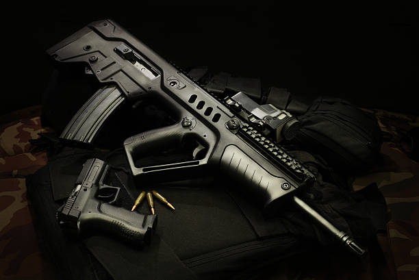 istock Israeli assault rifleswith handgun and ammunition 503580154