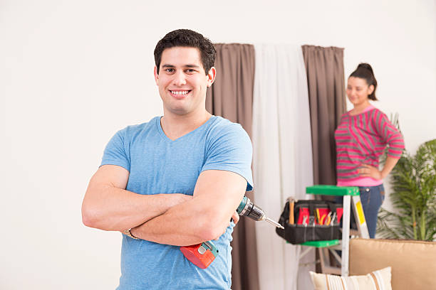 istock Construction: Latin couple work together on home improvement projects. 503580696