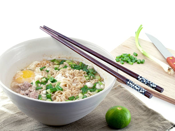 noodle with wooden cutting board and knife