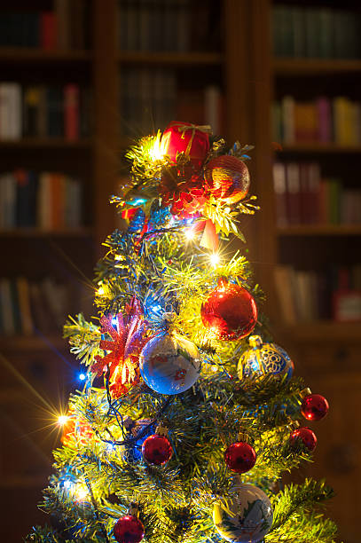 istock Christmas tree with lights in home living room 503581588
