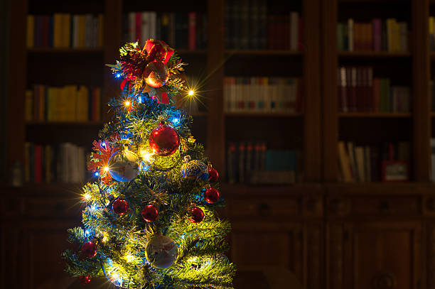 istock Christmas tree with lights in home living room 503581638