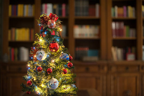istock Christmas tree with lights in home living room 503581690