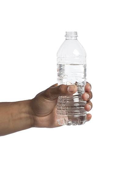istock hand holding bottle of water 503581924