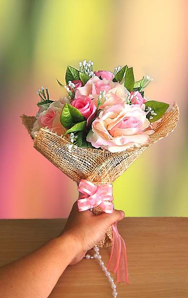 istock The flower in my hand 503582742