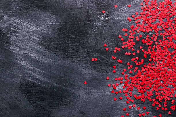 istock Red hearts against a dark background 503583396
