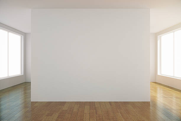 istock Empty light room with blank white wall in the center 503585058