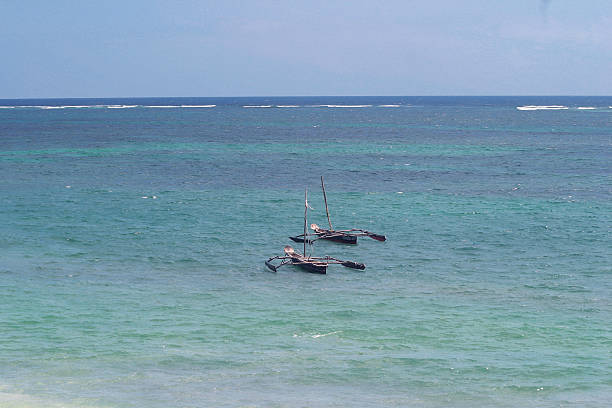 istock Boats in turquoise tropical sea 503585892