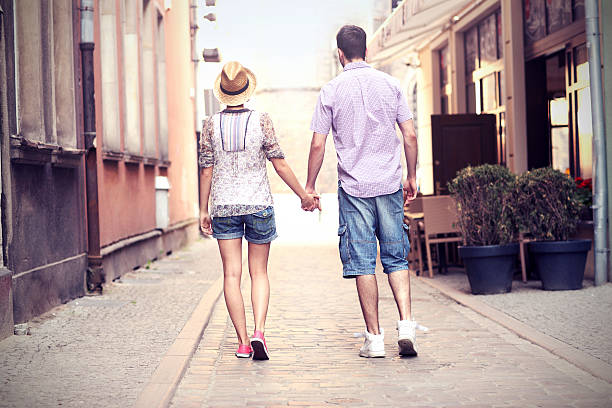 istock Young couple strolling about the city 503586676