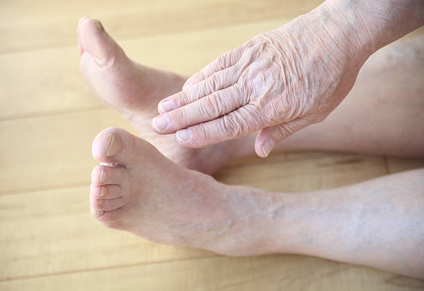 istock Sitting man tries to touch toes 503587154