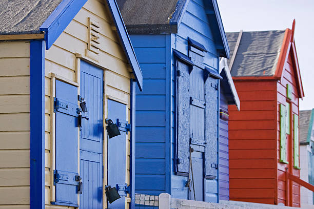 istock Line of traditional holiday chalets on the Devon coast UK 503588054