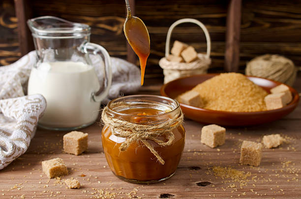 istock Homemade caramel sauce on wooden table 503590214