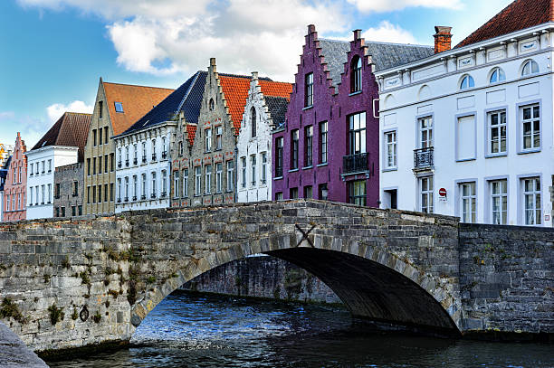 istock Medieval bridge over canal in Bruges 503590502
