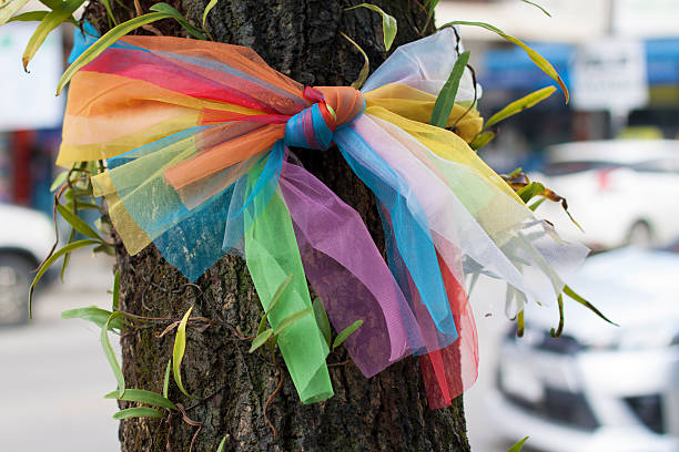 istock Ribbons on tree trunk in Thailand 503591564
