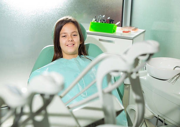 istock Little girl in dentist office 503591726