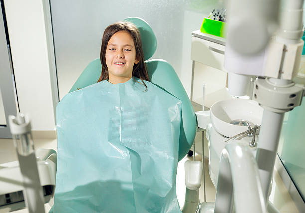 istock Little girl in dentist office 503591828