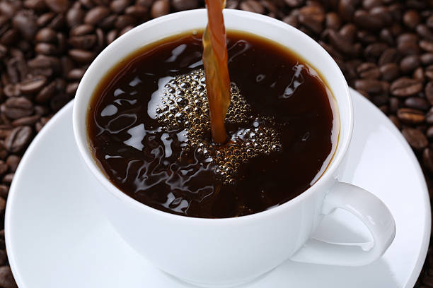 istock Hot coffee pouring in cup 503592040