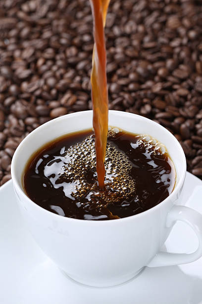 istock Hot fresh coffee pouring in cup 503592804