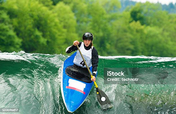 Young Female Canoeist Starting The Race Stock Photo - Download Image Now - Rapids - River, Kayak, Kayaking