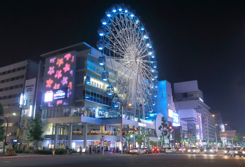 Nagoya Japan - 31 May, 2014: Tourists and local people visit Sunshine Sakae Shopping Centre and Ferris wheel by night in Sakae downtown Nagoya Japan.