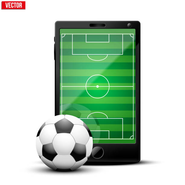istock Smartphone with football ball and field on the screen. 503599613