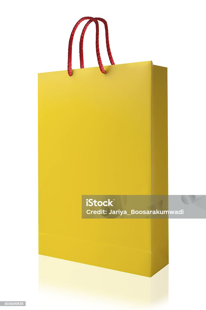 Yellow shopping bag, isolated with clipping path on white background. Yellow  shopping bag with reflect and copy space. Bag Stock Photo
