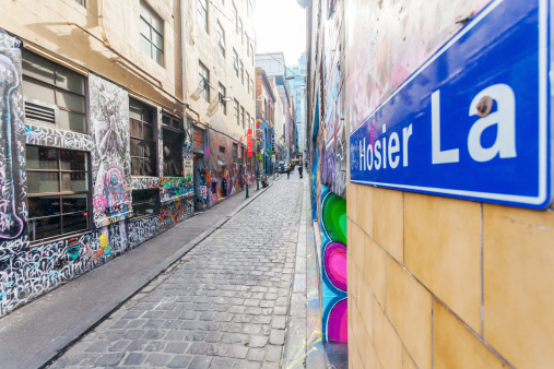Melbourne, Australia - July 21, 2014: Hosier Lane in Melbourne, Australia. Hosier Lane is a laneway in CBD of Melbourne, It is a popular landmark in Melbourne due to its graffitti covered walls and urban art.