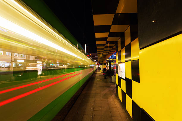 Hanover, Germany - December 03, 2015: artistic tram shelter at Steintor in Hanover with unidentified people. It is a city art project with 10 shelters. This one was designed by Alessandro Mendini 