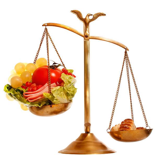 istock Balance with healthy vs heavy food 503614770