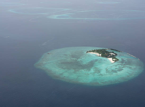 istock Atoll in Maldives from aerial view 503616344