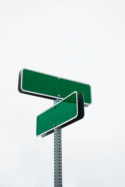 istock blank green street signs going in directions 503618216
