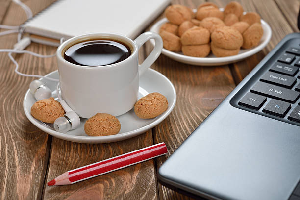 istock Cup of coffee and a laptop 503619080
